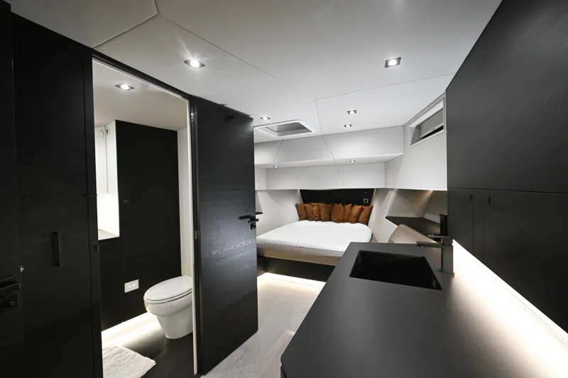 Slide: The Image of Luxurious interior of 2022 Vanquish VQ58 yacht featuring modern bedroom and bathroom. - 17