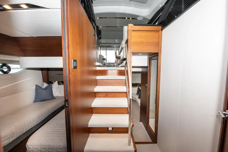 Slide: The Image of Luxurious interior of 2018 Princess S60 yacht with wooden stairs and cozy cabin. - 16