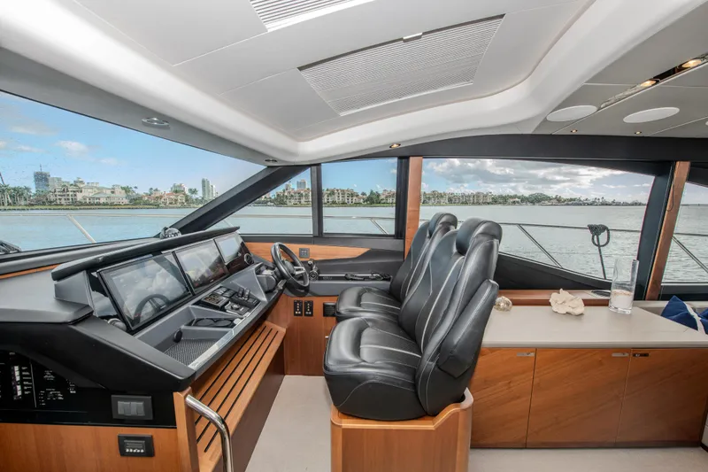 Slide: The Image of Luxurious 2018 Princess S60 yacht interior with sleek helm and panoramic windows. - 17