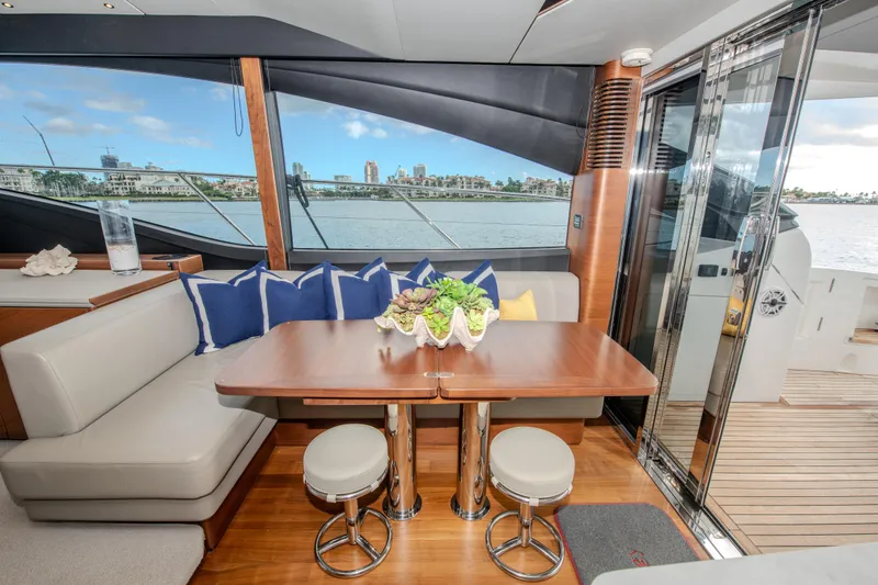 Slide: The Image of Luxurious interior of 2018 Princess S60 yacht with elegant dining area and waterfront view. - 19