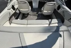 Slide: The Image of 2011 Bayliner 185 Bowrider interior with seating and steering area. - 3