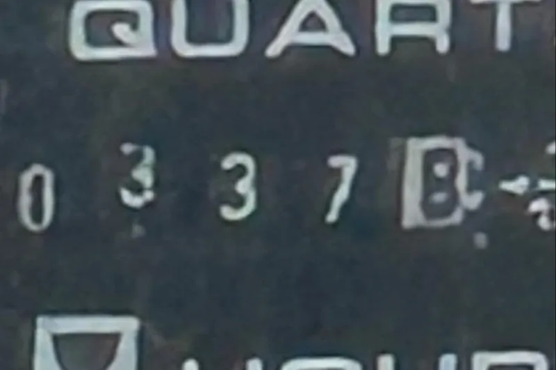Slide: The Image of Close-up of a Cobalt 252 2008 dashboard displaying "QUART" and numbers. - 4