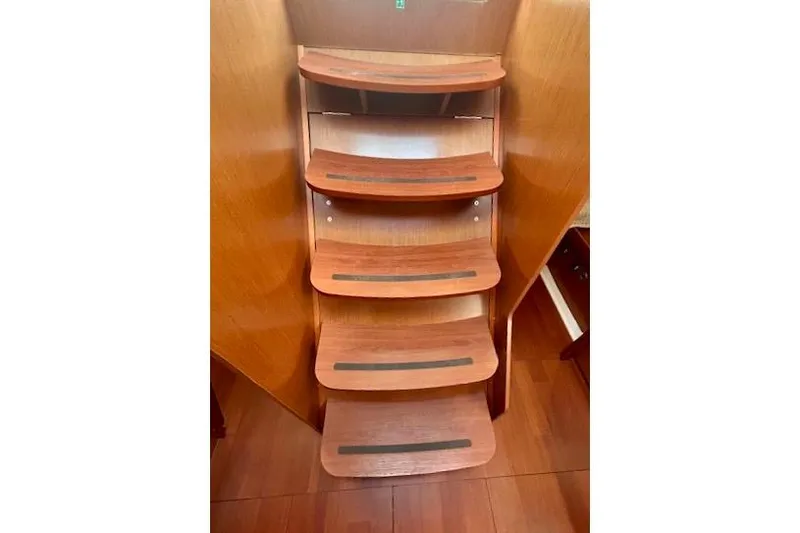 Slide: The Image of Wooden interior stairs of 2017 Beneteau Oceanis 41.1 yacht. - 24