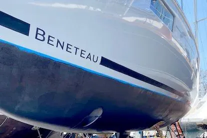 Slide: The Image of 2017 Beneteau Oceanis 41.1 sailboat hull in dry dock, showcasing sleek design. - 7