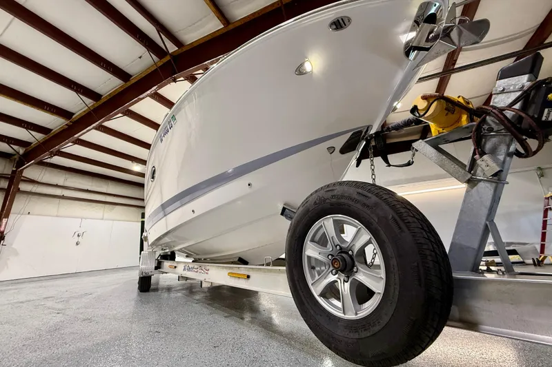 Slide: The Image of 2021 Chaparral 280 OSX boat on trailer in indoor storage facility. - 14