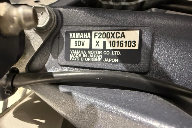 Slide: The Image of Yamaha F200XCA engine label on 2021 Chaparral 280 OSX, made in Japan. - 48