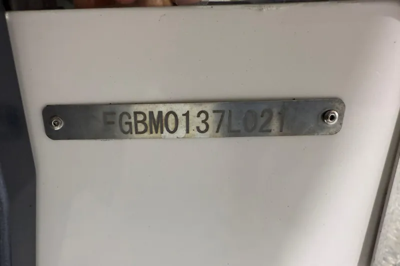 Slide: The Image of 2021 Chaparral 280 OSX boat identification plate with serial number FGBM0137L021. - 49