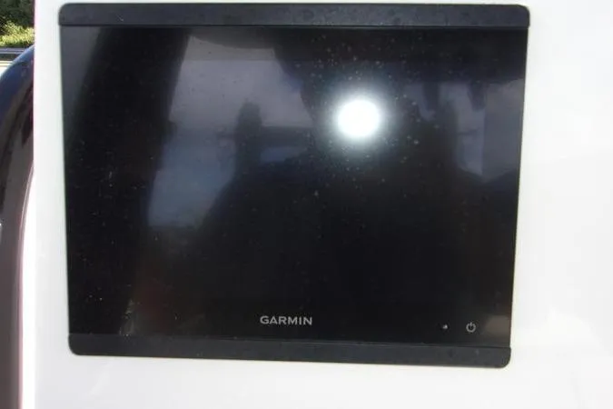 Slide: The Image of Garmin display screen on 2025 Key West 219 FS boat dashboard. - 11