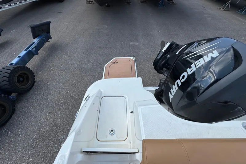 Slide: The Image of 2014 Sea Ray 220 Sundeck Outboard with Mercury engine on trailer. - 8