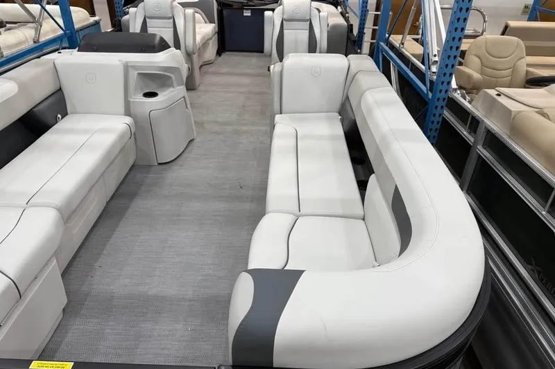 Slide: The Image of 2026 Godfrey SWEETWATER 2286 SB pontoon boat interior with spacious seating and modern design. - 3