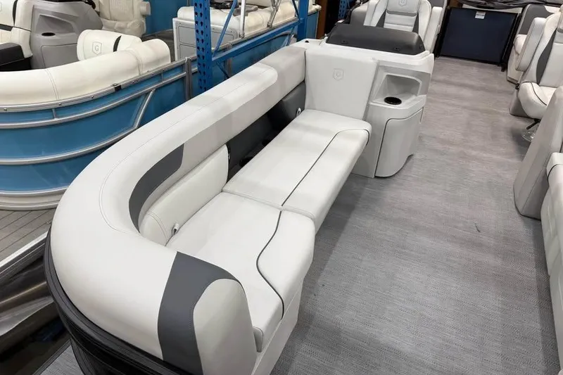 Slide: The Image of 2026 Godfrey SWEETWATER 2286 SB pontoon boat interior with white seating and cup holder. - 4