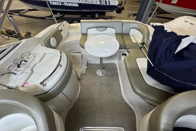 Slide: The Image of Interior of 2006 Sea Ray SDX 270 boat with seating and table. - 6