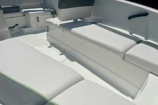 Slide: The Image of 2021 Tahoe T16 boat interior with white cushioned seating and sleek design. - 5