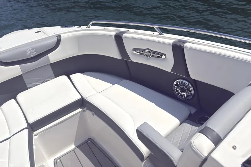 Slide: The Image of 2024 Chaparral 26 Surf boat interior with luxurious seating and sleek design. - 15