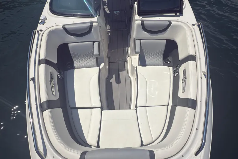 Slide: The Image of 2024 Chaparral 26 Surf boat interior with luxurious seating and sleek design. - 16