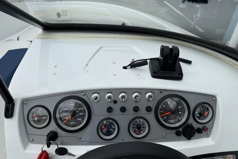 Slide: The Image of Dashboard of a 2019 Tahoe 450 TS boat with gauges and controls. - 3