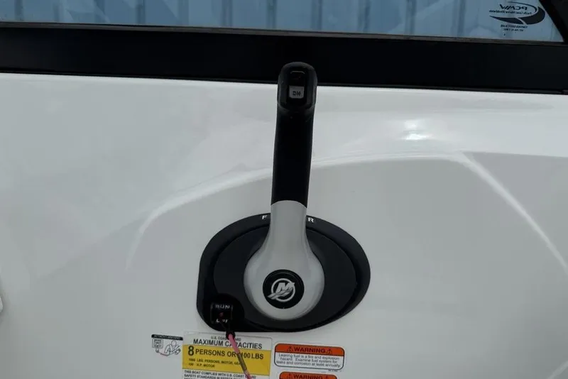 Slide: The Image of Throttle control lever on a 2019 Tahoe 450 TS boat. - 7