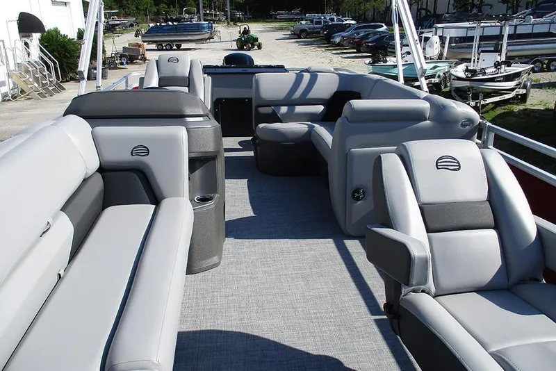 Slide: The Image of 2026 Sun Tracker SportFish 20 DLX pontoon boat with spacious seating and modern design. - 10
