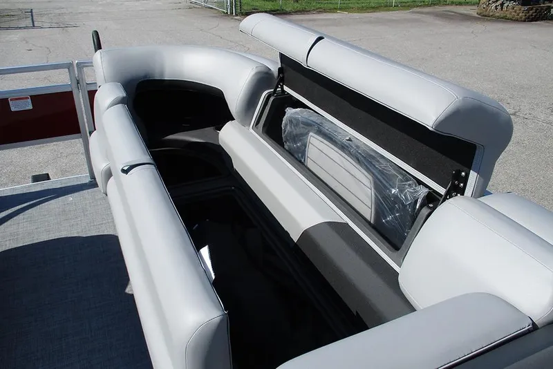 Slide: The Image of 2026 Sun Tracker SportFish 20 DLX boat interior with open storage compartment. - 12