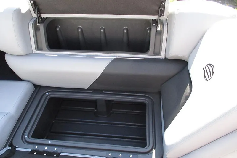 Slide: The Image of Sun Tracker SportFish 20 DLX 2026 boat seat with open storage compartment. - 19