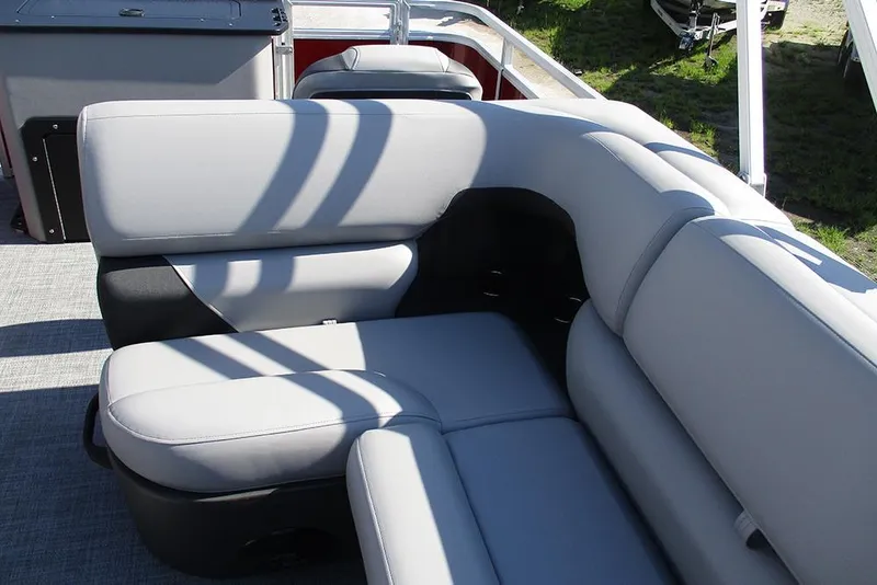 Slide: The Image of 2026 Sun Tracker SportFish 20 DLX boat interior with comfortable gray seating. - 20