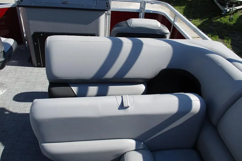 Slide: The Image of 2026 Sun Tracker SportFish 20 DLX boat interior with gray cushioned seating. - 21