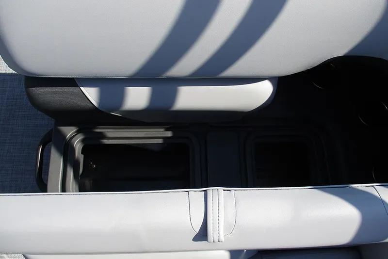 Slide: The Image of Interior storage compartment of 2026 Sun Tracker SportFish 20 DLX boat. - 22