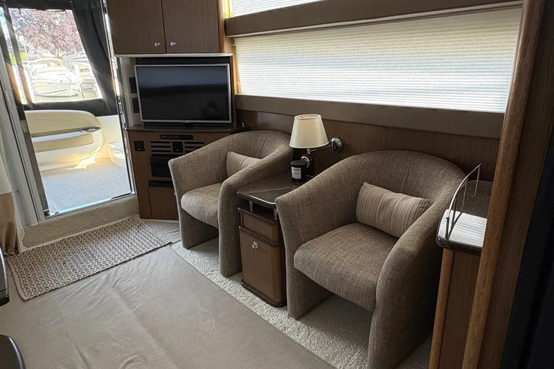 Slide: The Image of Luxurious interior of 2015 Meridian 441 Sedan yacht with cozy seating and modern amenities. - 10