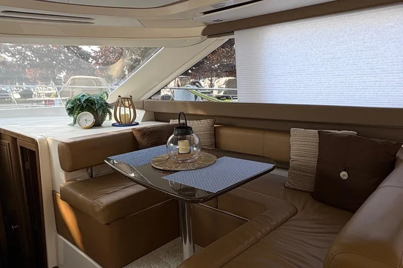 Slide: The Image of Luxurious interior of 2015 Meridian 441 Sedan yacht with elegant seating and decor. - 12