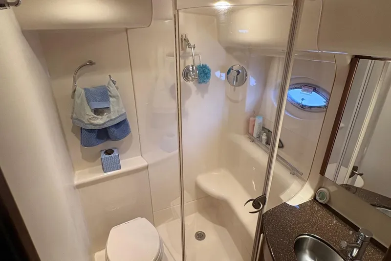 Slide: The Image of Luxurious bathroom in 2015 Meridian 441 Sedan yacht with shower and sink. - 16