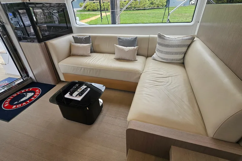 Slide: The Image of Luxurious interior of 2022 Azimut 66 yacht with beige leather seating and modern decor. - 36