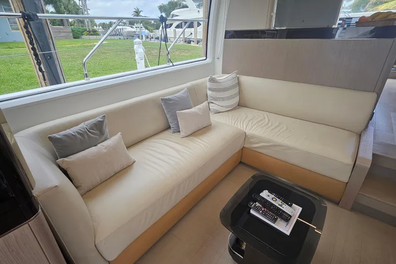 Slide: The Image of Luxurious interior of 2022 Azimut 66 yacht with plush seating and modern decor. - 37