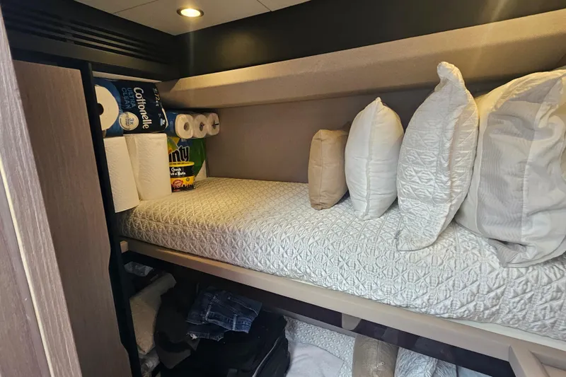 Slide: The Image of Cozy Azimut 66 yacht cabin with pillows, storage, and essentials, 2022 model. - 56