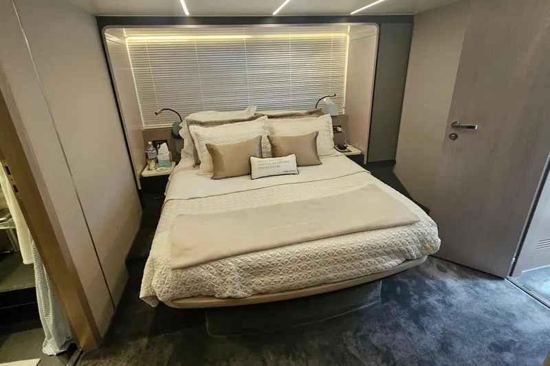 Slide: The Image of Luxurious bedroom interior of 2022 Azimut 66 yacht with elegant bedding and modern design. - 61