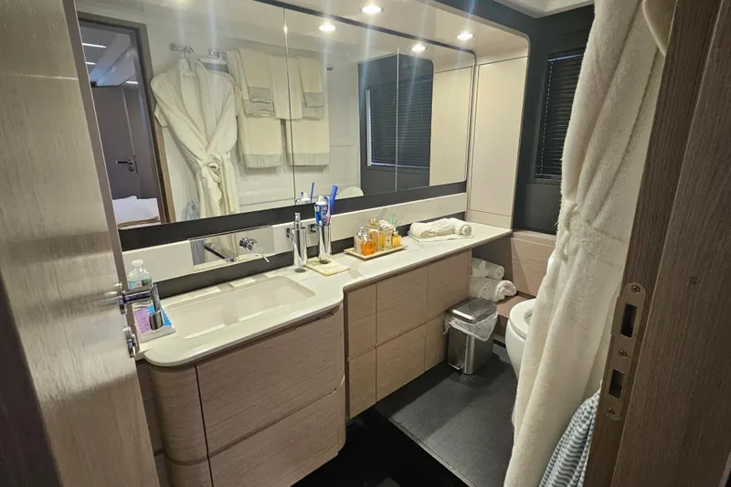 Slide: The Image of Luxurious bathroom in 2022 Azimut 66 yacht, featuring modern fixtures and elegant design. - 64