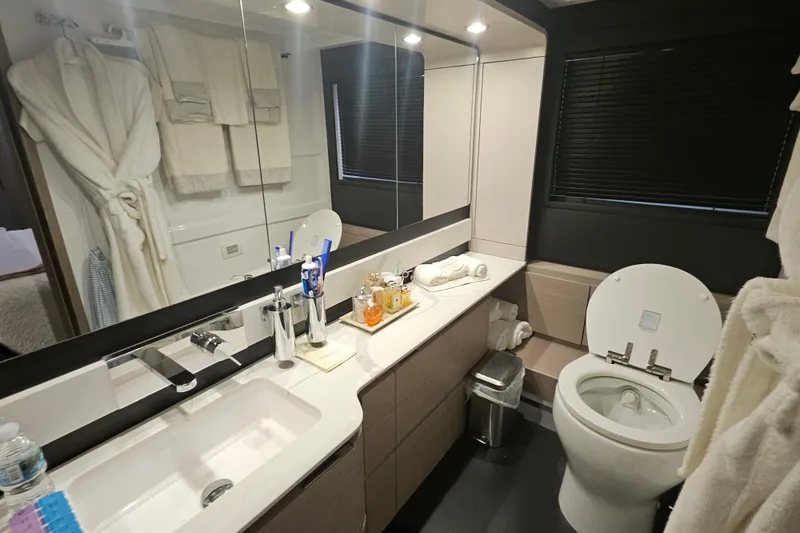 Slide: The Image of Luxurious bathroom in 2022 Azimut 66 yacht with modern fixtures and elegant design. - 65