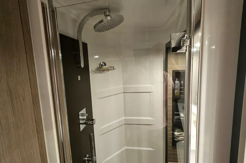 Slide: The Image of Luxurious shower in 2022 Azimut 66 yacht, featuring modern fixtures and sleek design. - 66