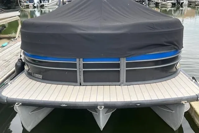 Slide: The Image of 2018 Misty Harbor S2385SU pontoon boat with black cover docked at marina. - 6