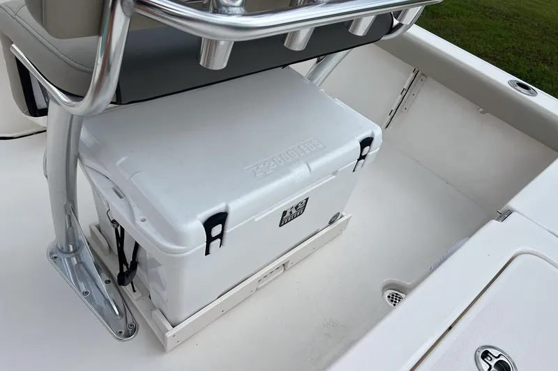 Slide: The Image of 2026 Key West 210 Bay Reef boat seat with gray and white upholstery, featuring KW logo. - 15