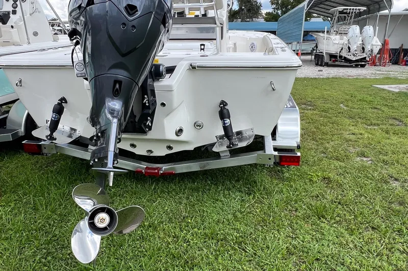 Slide: The Image of 2026 Key West 210 Bay Reef boat console with steering wheel and gauges. - 6