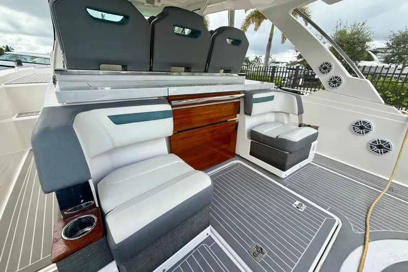 Slide: The Image of 2019 Tiara Sport 38 LS boat interior with luxurious seating and sleek design. - 19