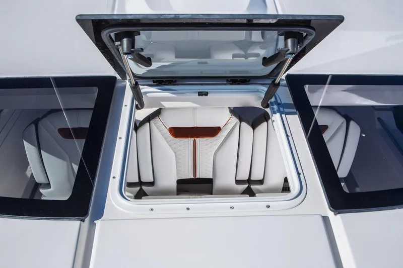 Slide: The Image of Manufacturer Provided Image: 2019 Tiara Sport 38 LS open hatch with luxurious seating. - 20