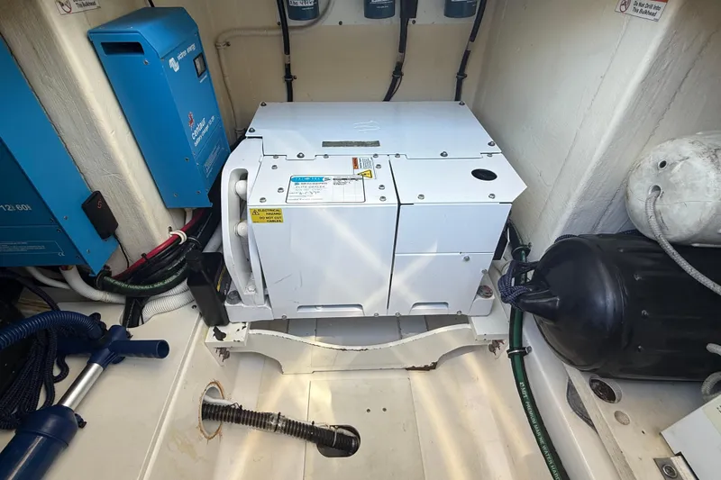 Slide: The Image of Engine room of 2019 Tiara Sport 38 LS with generator and equipment. - 31