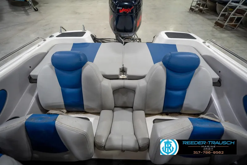 Slide: The Image of 2006 Skeeter SL 190 boat interior with blue and gray seating, displayed at Reeder-Trausch Marine. - 20