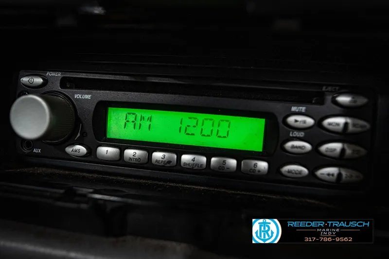 Slide: The Image of 2006 Skeeter SL 190 boat stereo displaying AM 1200 frequency. - 35
