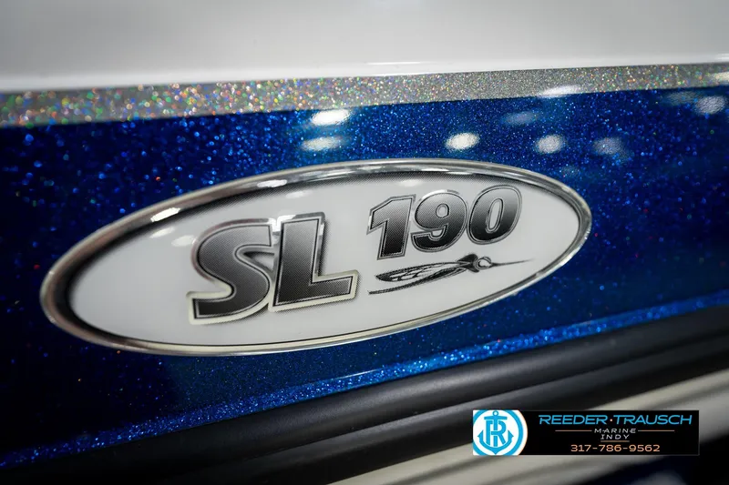 Slide: The Image of 2006 Skeeter SL 190 boat emblem on a sparkling blue surface. - 43