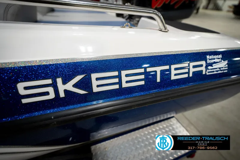 Slide: The Image of 2006 Skeeter SL 190 boat with blue glitter finish, displayed at Reeder-Trausch Marine. - 44