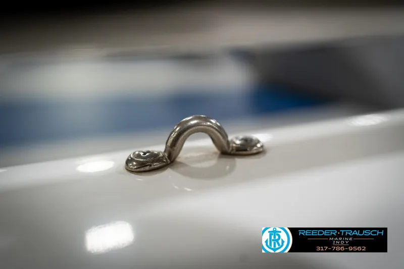 Slide: The Image of Close-up of a 2006 Skeeter SL 190 boat cleat, Reeder Trausch Marine logo visible. - 51