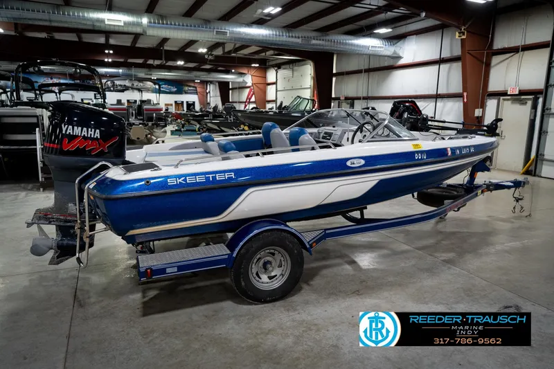 Slide: The Image of 2006 Skeeter SL 190 boat with Yamaha VMAX engine in indoor showroom. - 6