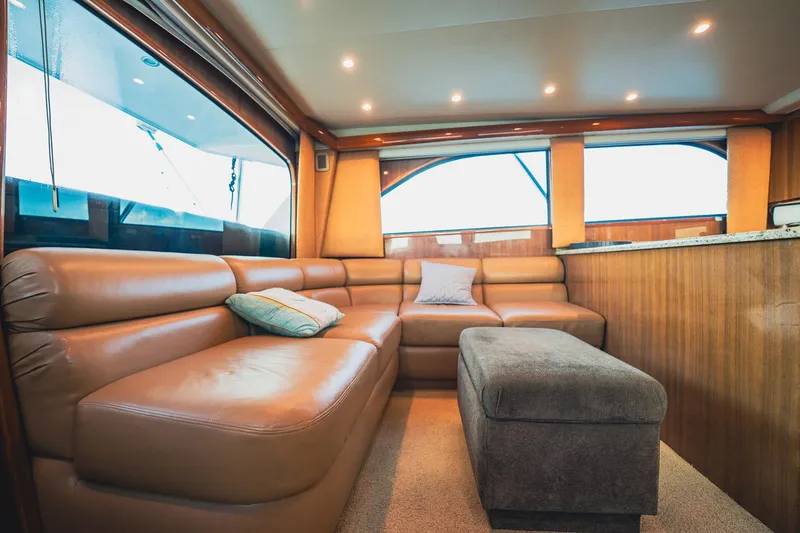 Slide: The Image of Luxurious interior of 2005 Viking 48 Convertible yacht with leather seating and modern design. - 11